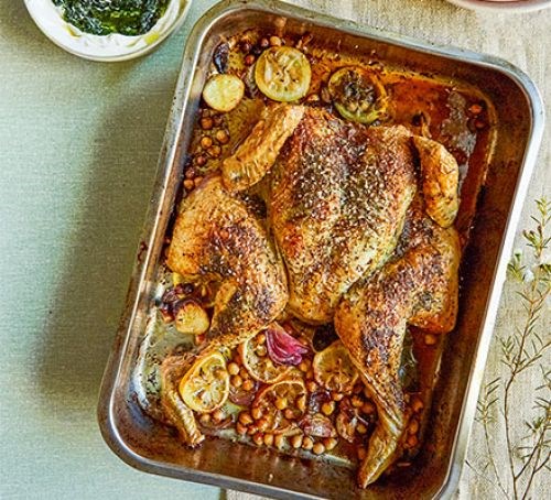 Herby spatchcocked chicken with crispy chickpeas and wild garlic labneh
