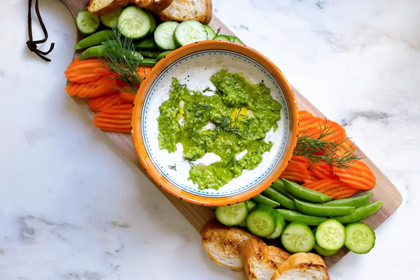 Herby whipped ricotta with pea & walnut pesto