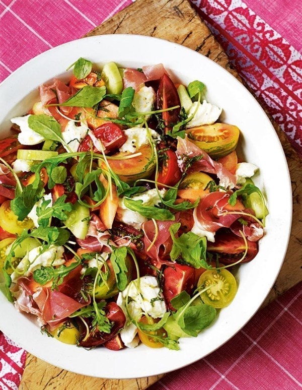 Heritage tomato salad with air-dried ham, melon and mozzarella