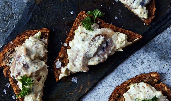 Herring in mustard sour cream on rye bread