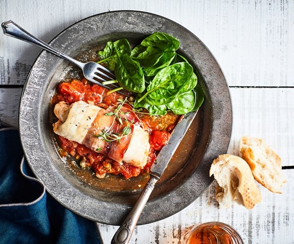 Hoki & prosciutto bundles with tomato & caper sauce