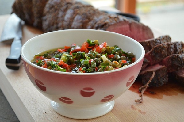 Holiday beef tenderloin with parsley-red pepper sauce
