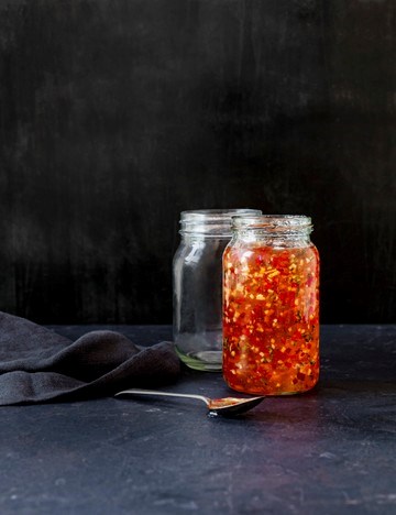 Homemade apple jelly with chilli, mint and ginger
