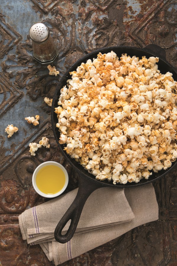 Homemade bacon popcorn topped with clarified butter