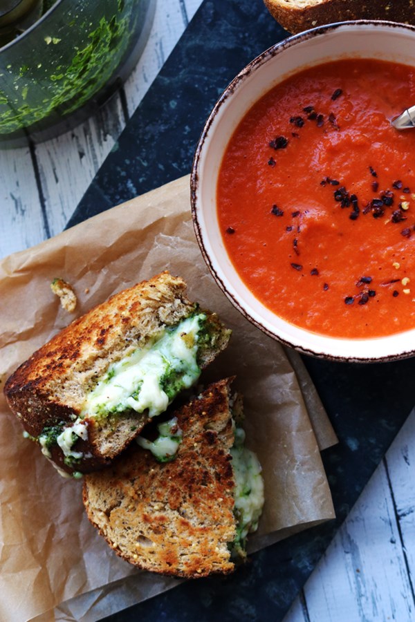 Homemade basil pesto and cheddar grilled cheese with creamy tomato soup