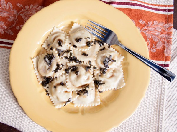 Homemade butternut squash and blue cheese ravioli with sage brown butter sauce