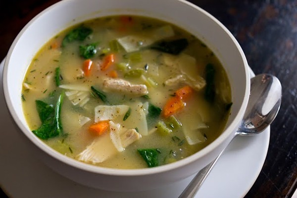 Homemade chicken noodle soup with spinach