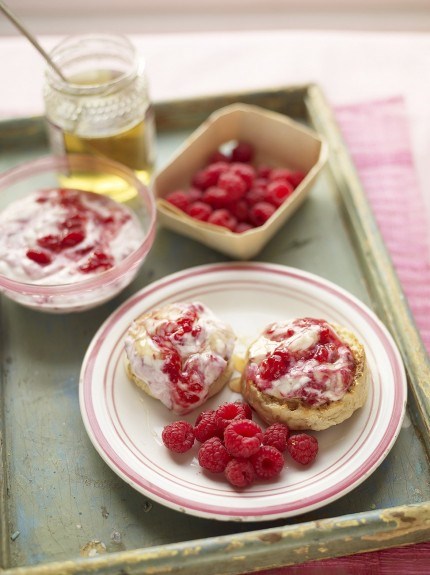 Homemade cinnamon & lemon crumpets with raspberries and honey