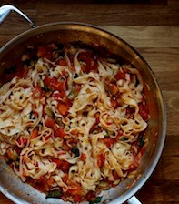 Homemade fettuccine with quick tomato-olive sauce