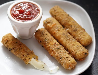Homemade mozzarella sticks with herbed tomato sauce