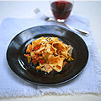 Homemade pappardelle with sweet pepper and sausage