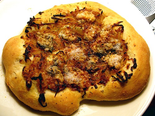 Homemade pizza with caramelized onions, rosemary & Gorgonzola