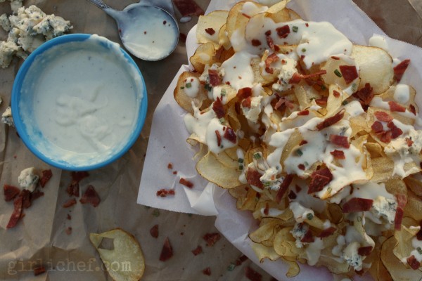 Homemade potato chips with blue cheese sauce