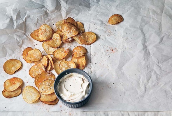 Homemade potato chips with pecorino