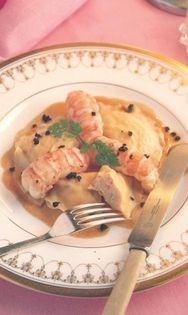 Homemade ravioli filled with a mousse of langoustine, basil and truffle