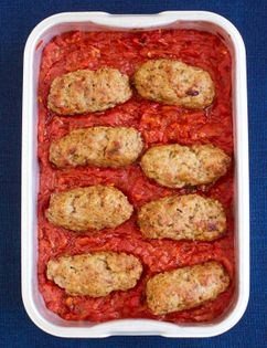 Homemade sausages with tomato sauce