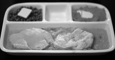Homemade TV dinner: turkey with cornbread dressing, peas & sweet potatoes