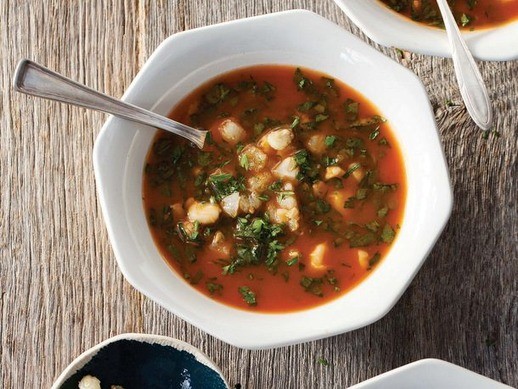 Hominy and spinach in tomato-garlic broth from 'Afro-Vegan' (Cook the Book)