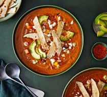 Hominy white corn, guajillo chilli and tortilla soup with queso fresco