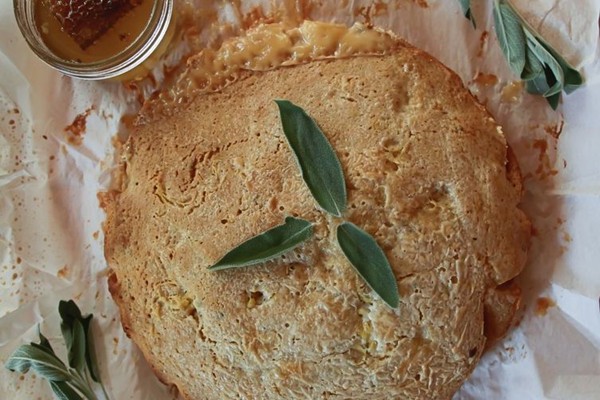 Honey and cornmeal cake with lemon and herb custard