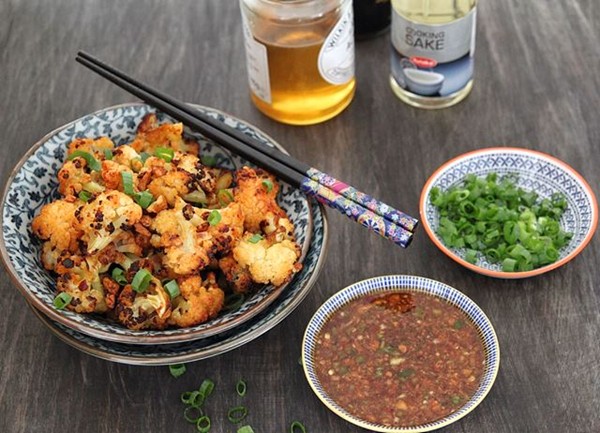 Honey and garlic roasted cauliflower with spicy sake dipping sauce