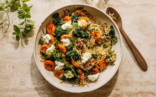Honey and harissa roast apricots with spinach, labneh and couscous
