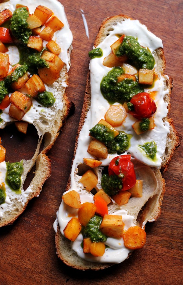 Honey chipotle-roasted parsnip and carrot crostini with whipped ricotta and pesto