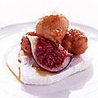 Honey fritters with orange sauce