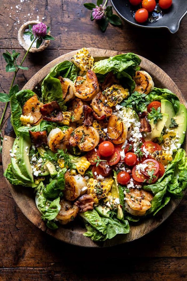 Honey garlic shrimp, corn, and avocado bacon salad