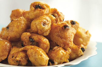 Honey-glazed doughnuts with raisins and pine nuts