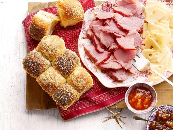 Honey-glazed ham and checkerboard rolls