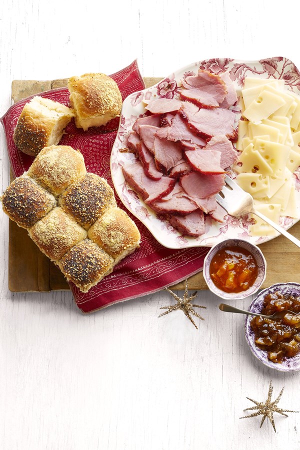 Honey-glazed ham and checkerboard rolls
