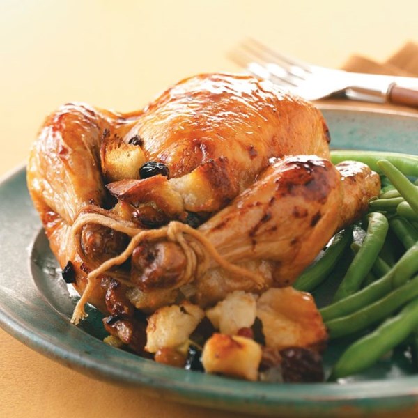 Honey-glazed hens with fruit stuffing