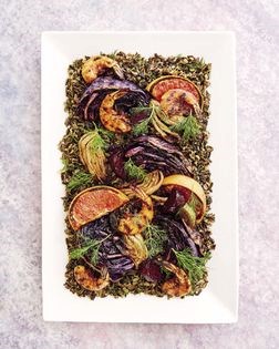 Honey-harissa grilled shrimp with roasted vegetables, charred grapefruit, and wild rice