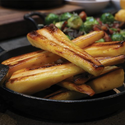 Honey roast parsnips