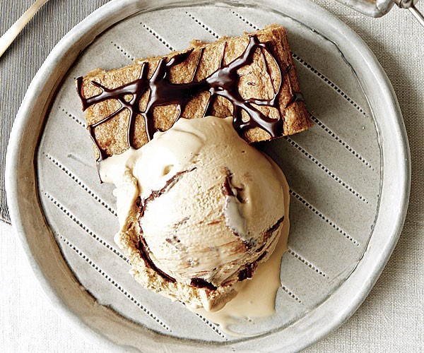 Honey-roasted peanut blondies with fudge ripple caramel ice cream