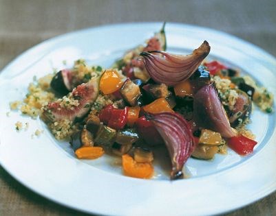 Honey-roasted vegetables with cumin and fig couscous and olive sauce