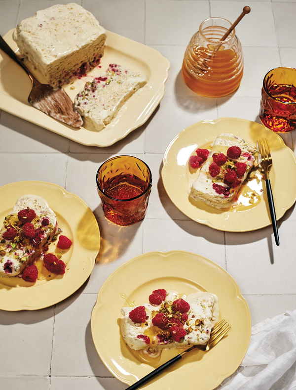 Honey semifreddo with raspberries and pistachios