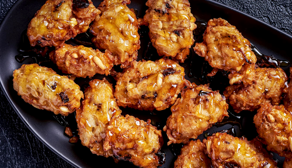 Honey-soaked matzo fritters (Pizzarelle con miele)