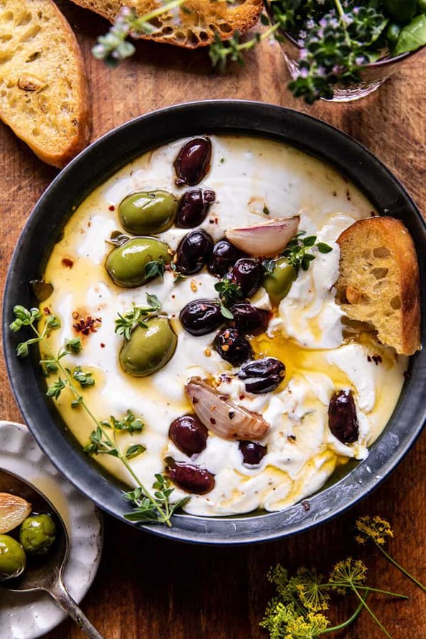 Honey whipped feta with garlic herb roasted olives