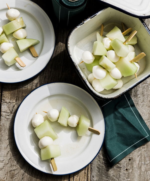 Honeydew and mozzarella on a stick