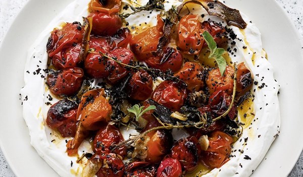 Hot charred cherry tomatoes with cold yoghurt