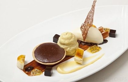 Hot chocolate tart with banana and passion fruit ice cream