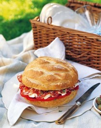 Hot crusty loaf filled with mozzarella, salami & tomato 