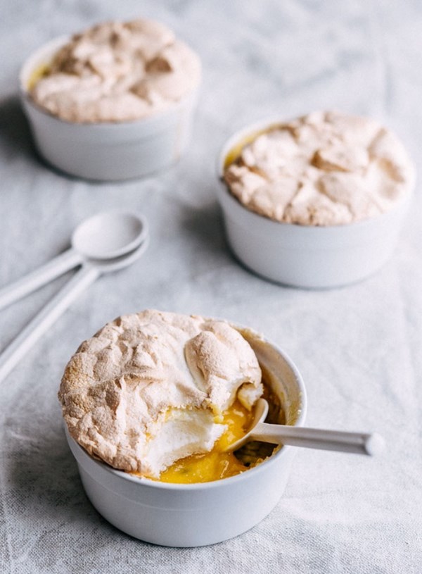 Hot lemon meringue and passionfruit puddings