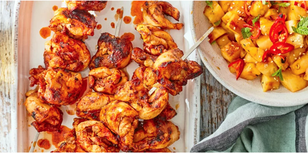 Hot paprika chicken kebabs with grilled pineapple