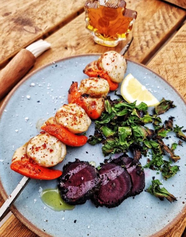 Hot pepper and maple-glazed scallops with beet and kale
