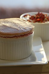 Hot raspberry souffle with rose petal cream