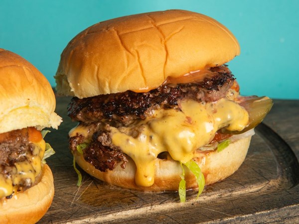 Hot sauce smashed burgers
