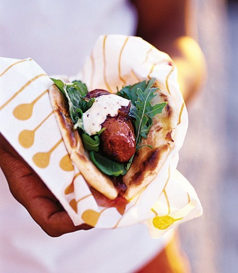 Hot sausage pittas with caramelised onions and mustard mayo